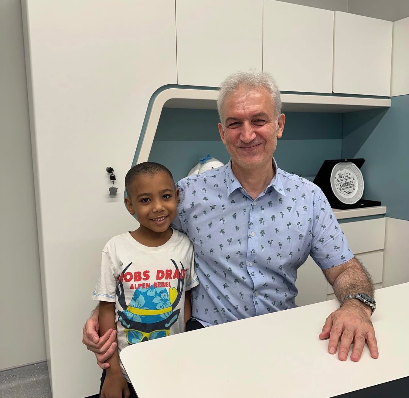Consultation with a paediatric patient and family.